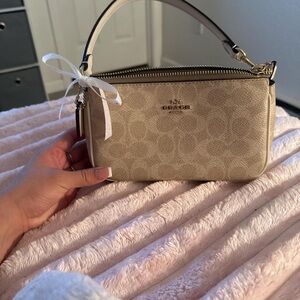 Coach Tan Wristlet with Gold Details